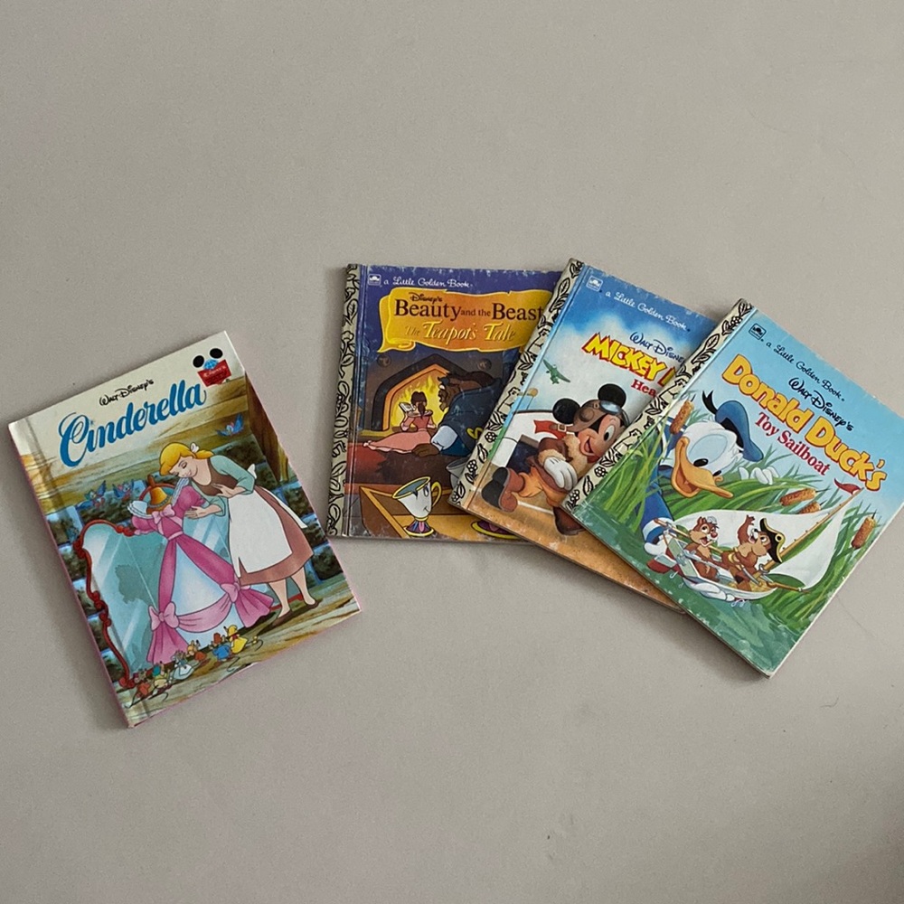 Three Little Golden Books Walt Disney’s titles and one Disney’s book Cinderella